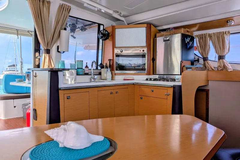 Slide: The Image of Interior of 2012 Fountaine Pajot Lipari Owners Version catamaran kitchen area. - 21