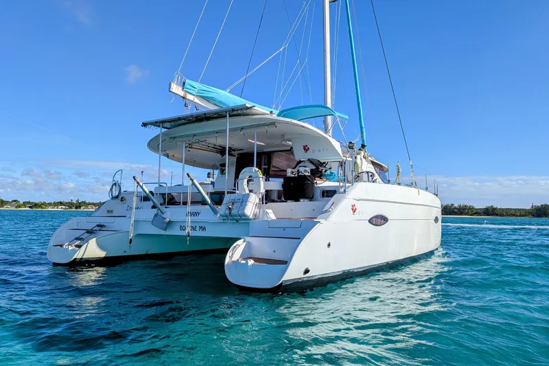 Slide: The Image of 2012 Fountaine Pajot Lipari catamaran sailing on clear blue waters. - 3