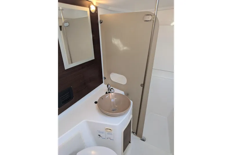 Slide: The Image of Modern bathroom in 2012 Fountaine Pajot Lipari catamaran with sleek sink and mirror. - 35