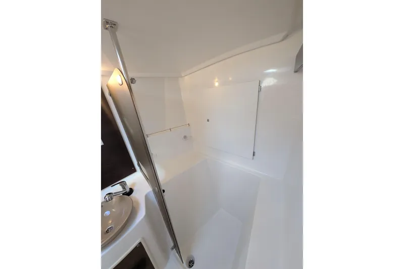 Slide: The Image of 2012 Fountaine Pajot Lipari yacht bathroom with sink and shower area. - 37