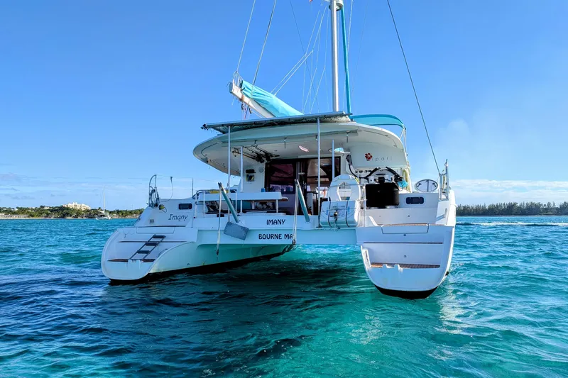 Slide: The Image of 2012 Fountaine Pajot Lipari catamaran sailing on clear blue waters. - 4