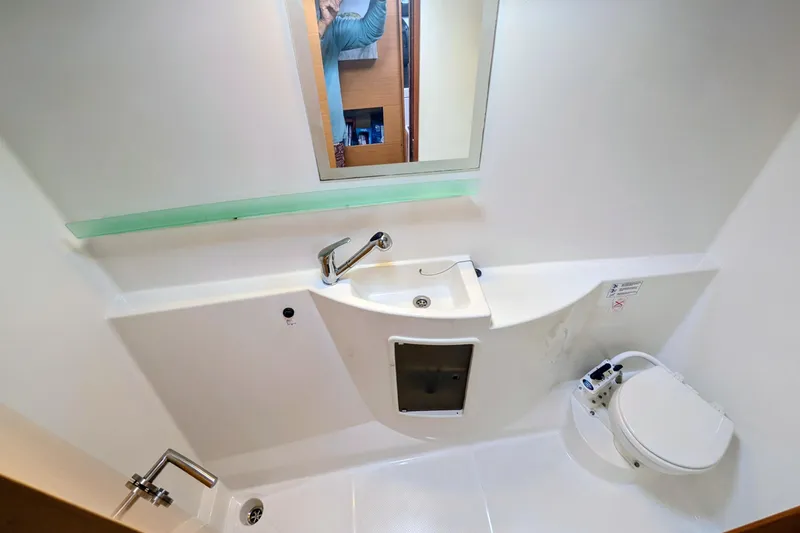 Slide: The Image of Bathroom interior of 2012 Fountaine Pajot Lipari catamaran with sink and toilet. - 40