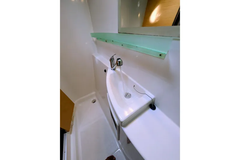 Slide: The Image of Bathroom sink area in 2012 Fountaine Pajot Lipari catamaran, featuring modern fixtures. - 42