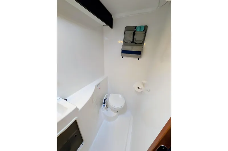 Slide: The Image of Compact bathroom in 2012 Fountaine Pajot Lipari catamaran, featuring toilet and storage. - 43