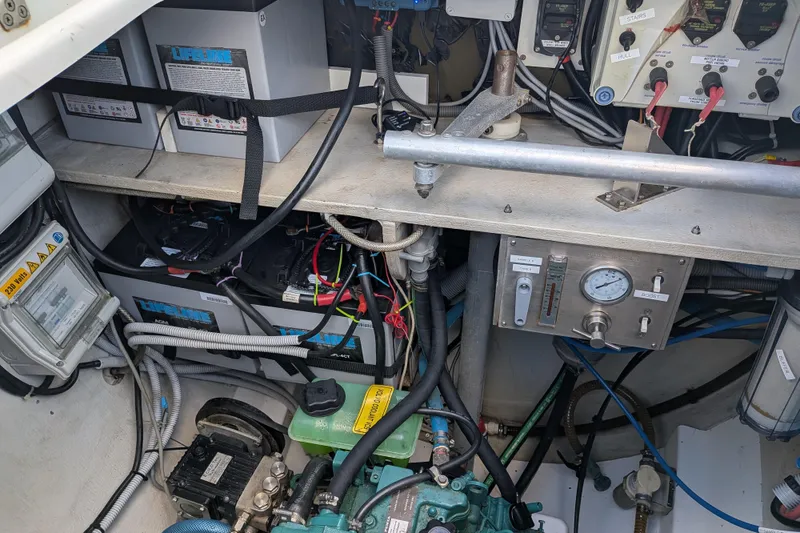 Slide: The Image of Engine room of 2012 Fountaine Pajot Lipari catamaran with batteries and control panel. - 44