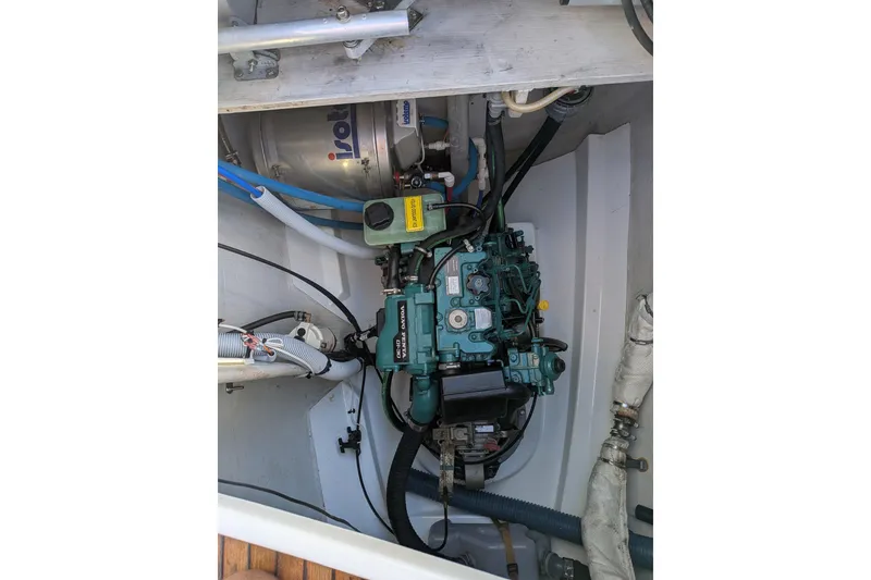 Slide: The Image of Engine compartment of 2012 Fountaine Pajot Lipari catamaran, showcasing mechanical components. - 52