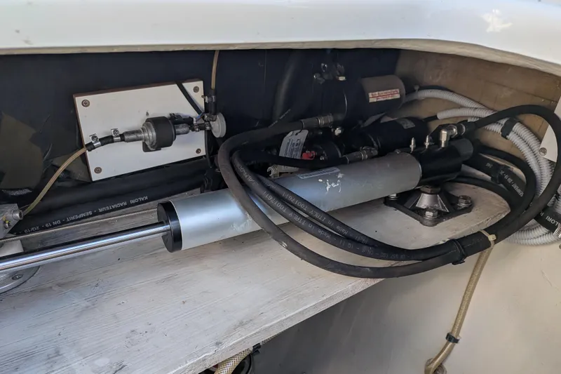 Slide: The Image of Hydraulic system inside 2012 Fountaine Pajot Lipari catamaran, showcasing hoses and components. - 53