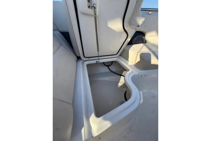 Slide: The Image of Open storage compartment on a 2020 Boston Whaler 270 Vantage boat. - 15