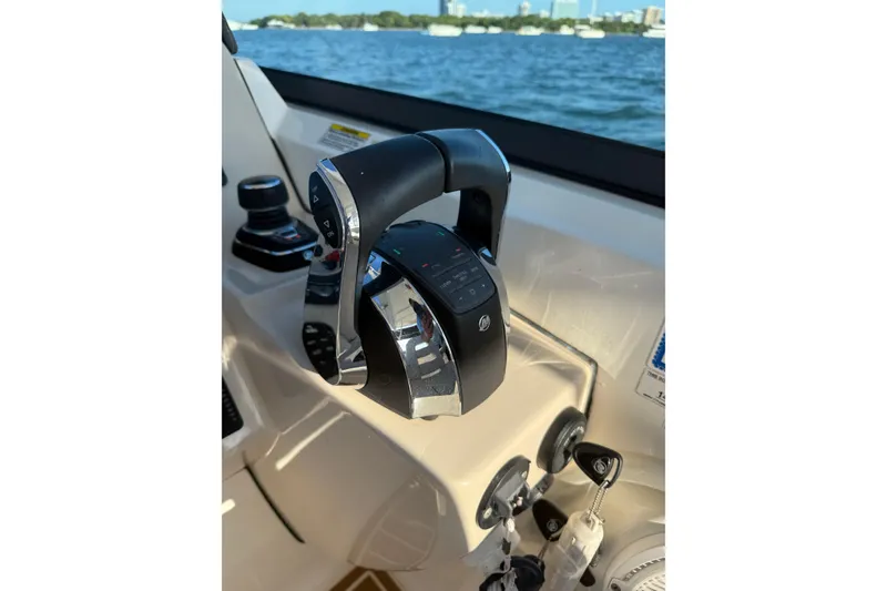 Slide: The Image of Control panel of 2020 Boston Whaler 270 Vantage boat with throttle levers. - 20
