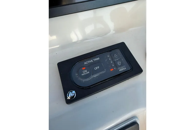 Slide: The Image of Control panel of 2020 Boston Whaler 270 Vantage boat, featuring active trim settings. - 22
