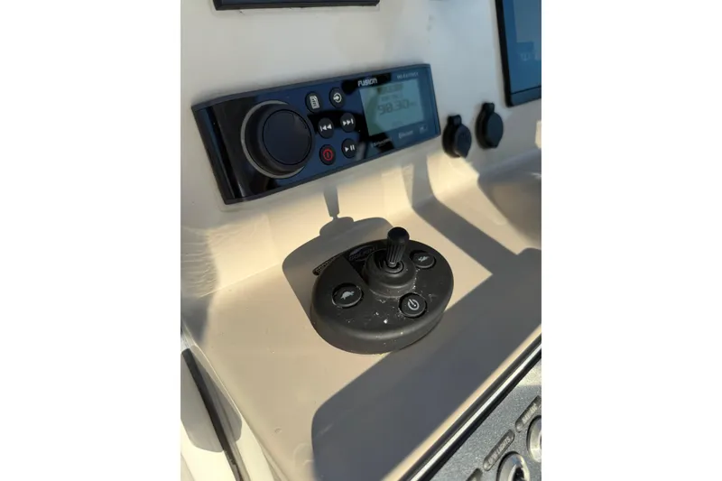 Slide: The Image of Control panel of 2020 Boston Whaler 270 Vantage boat with joystick and display. - 24