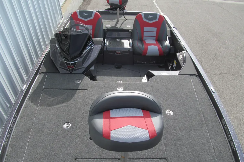 Slide: The Image of 2026 Ranger Z520 boat interior with red and gray seating, featuring a sleek design. - 8