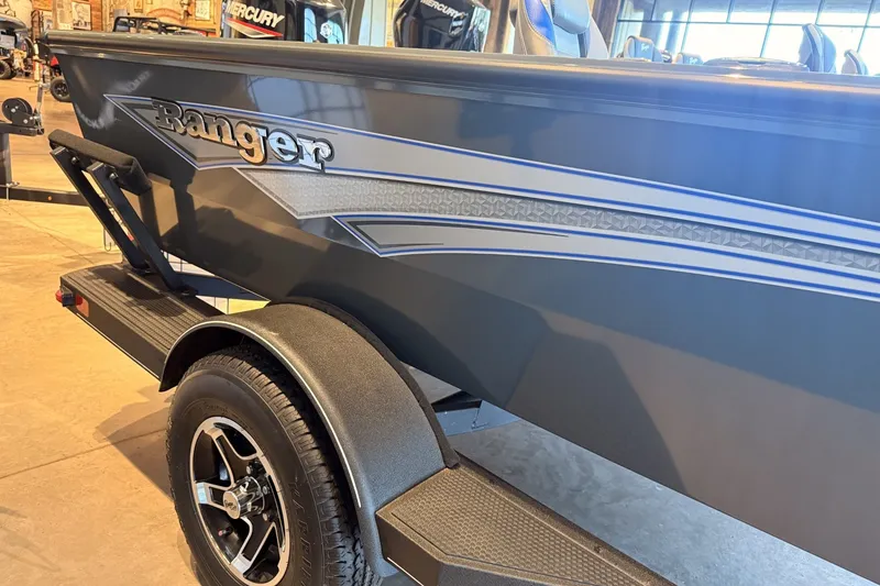 Slide: The Image of 2026 Ranger VS1665SC boat on trailer, showcasing sleek design and branding. - 5