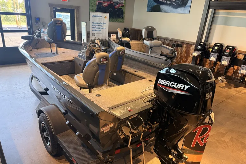 Slide: The Image of 2026 Ranger VS1665SC boat with Mercury 50 engine displayed in showroom. - 9