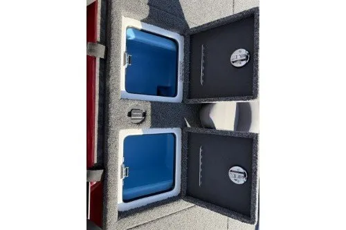 Slide: The Image of 2026 Nitro Z19 XL boat storage compartments with blue interiors and secure latches. - 89