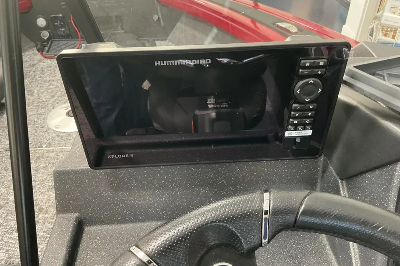 Slide: The Image of 2026 Tracker Targa V-19 Combo dashboard with Humminbird Xplore 9 display. - 10