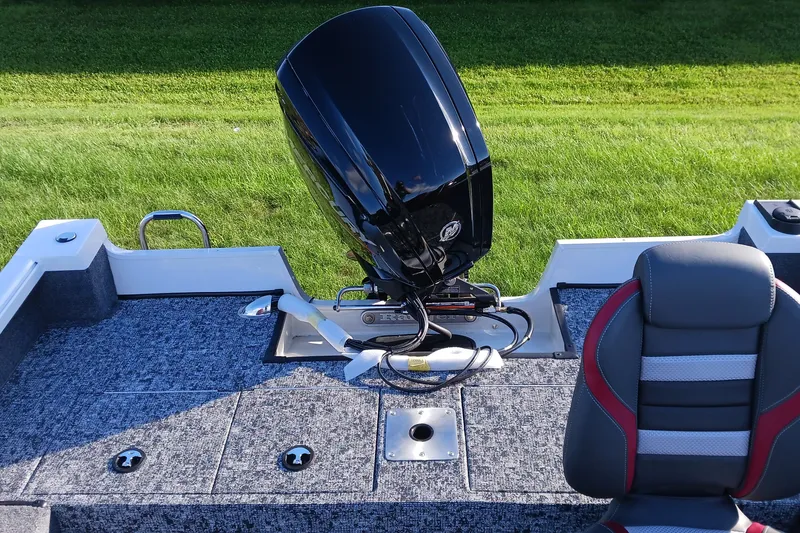 Slide: The Image of 2026 Ranger VS1682SC Angler boat interior with motor and seating. - 10
