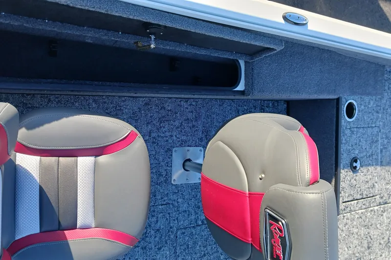 Slide: The Image of 2026 Ranger VS1682SC Angler boat interior with gray and red seating. - 7