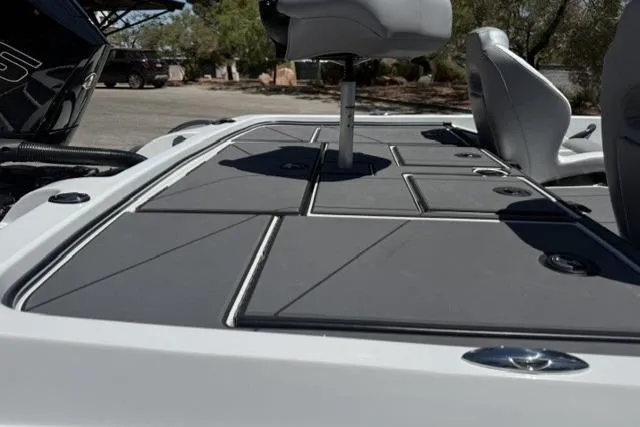 Slide: The Image of 2026 Nitro Z19 XL boat deck with sleek gray panels and seating. - 9