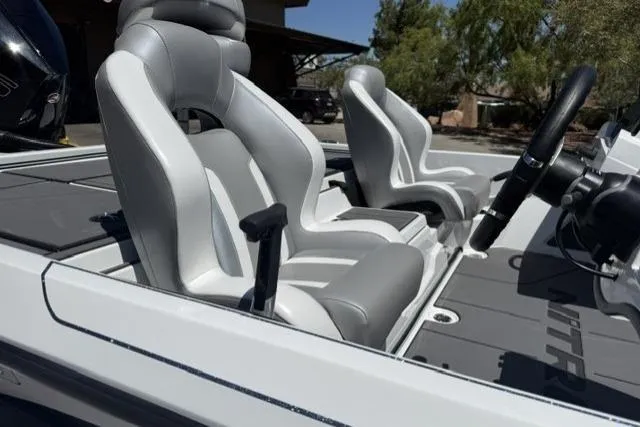 Slide: The Image of 2026 Nitro Z19 XL boat interior with sleek gray seating and modern design. - 10