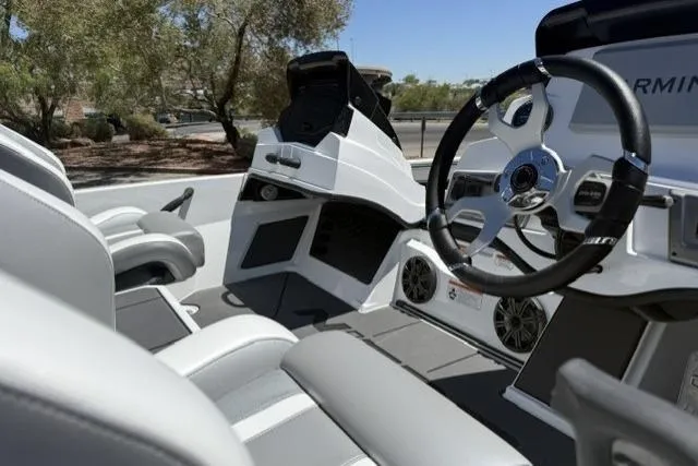 Slide: The Image of Interior of 2026 Nitro Z19 XL boat with modern steering and seating. - 7