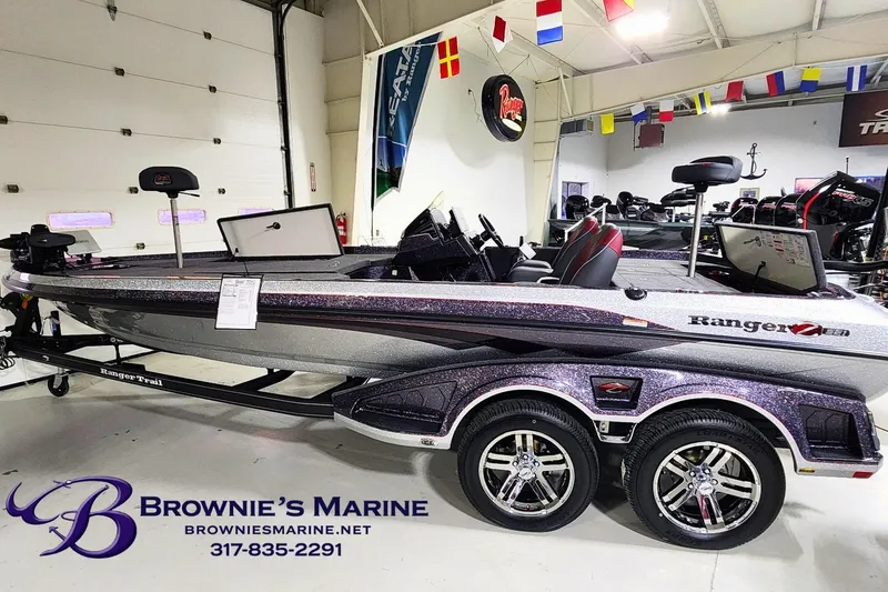 The Image of 2026 Ranger Z521 boat displayed at Brownie's Marine showroom with trailer. - 2