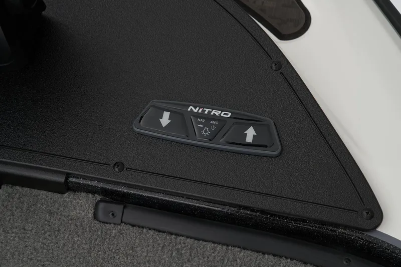 Slide: The Image of 2026 Nitro Z20 XL Pro boat with open storage compartment, red and gray design. - 19