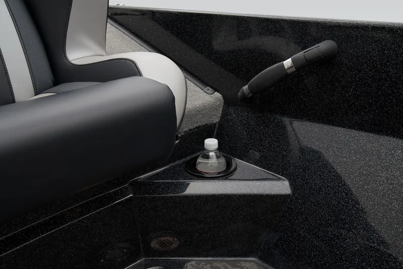 Slide: The Image of 2026 Nitro Z20 XL Pro boat interior with gray carpet and red seating. - 54