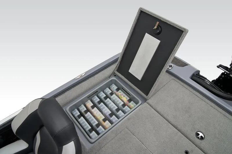 Slide: The Image of 2026 Nitro Z20 XL Pro boat interior with storage compartment and red-gray seating. - 57