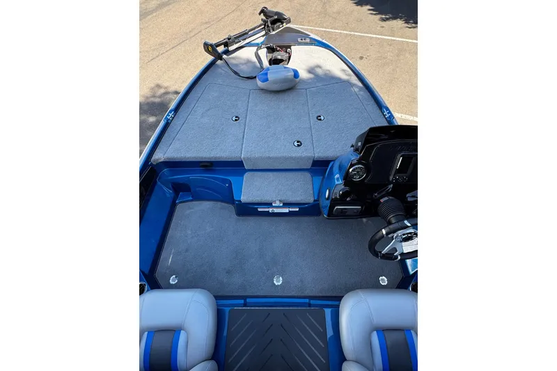 Slide: The Image of 2026 Nitro Z17 boat interior with gray seating and advanced steering controls. - 5