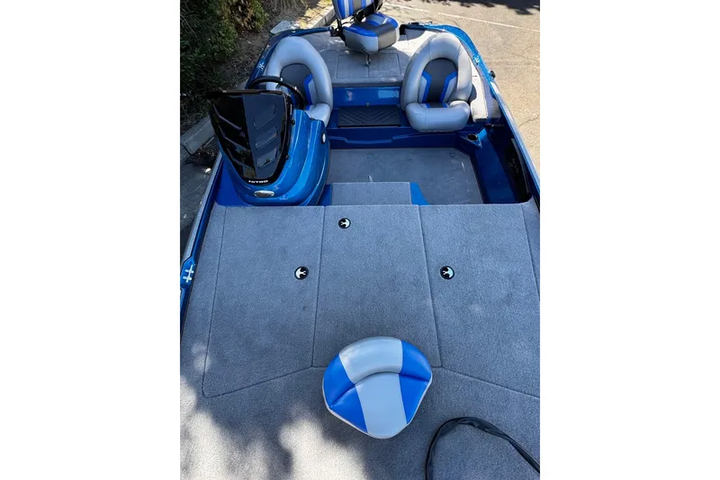 Slide: The Image of 2026 Nitro Z17 boat interior with gray and blue seating, spacious deck, and modern design. - 6