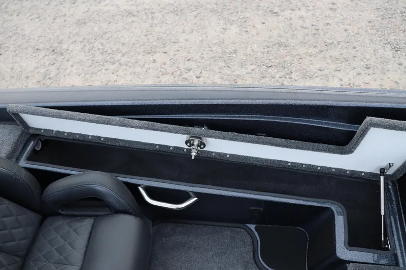 Slide: The Image of 2026 Phoenix 721 ZXL interior storage compartment with black leather seats and sleek design. - 9