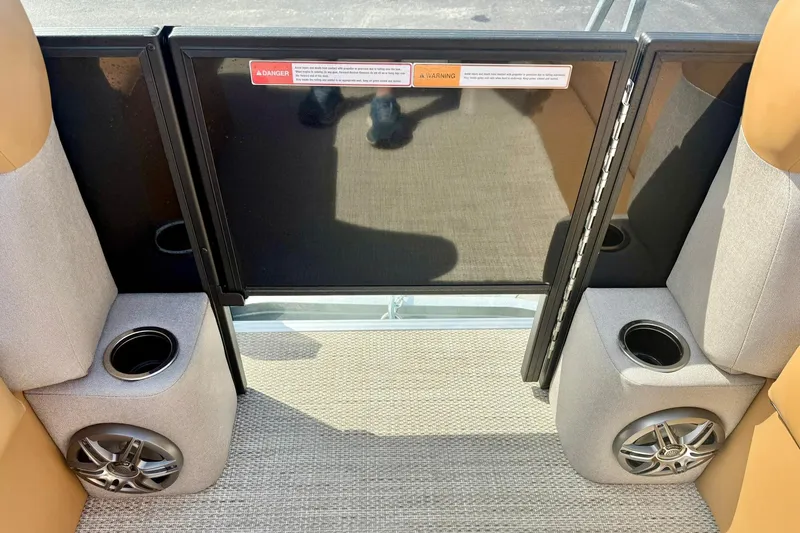 Slide: The Image of Interior of 2026 Crest Conquest SE 200 Fish boat with cup holders and speakers. - 12