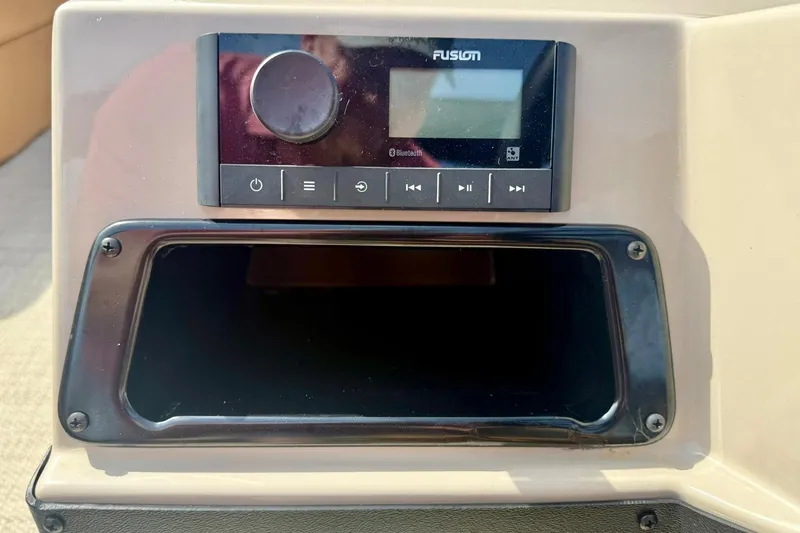Slide: The Image of Fusion audio system on 2026 Crest Conquest SE 200 Fish boat dashboard. - 21