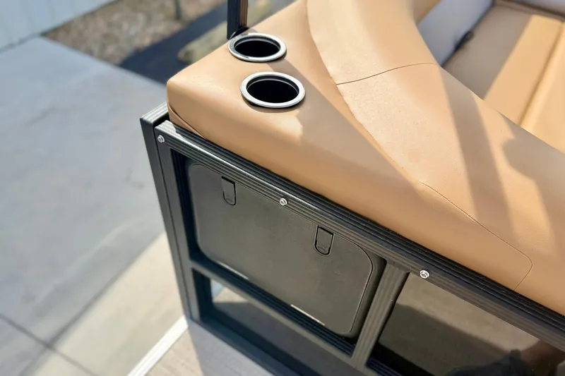 Slide: The Image of 2026 Crest Conquest SE 200 Fish boat seat with cup holders, tan upholstery. - 35