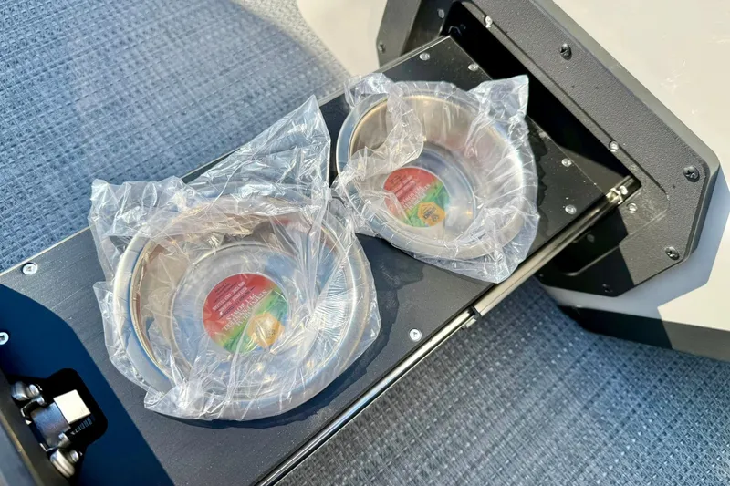 Slide: The Image of Stainless steel bowls in plastic wrap on Crest Conquest 210 Fish boat, 2026 model. - 24