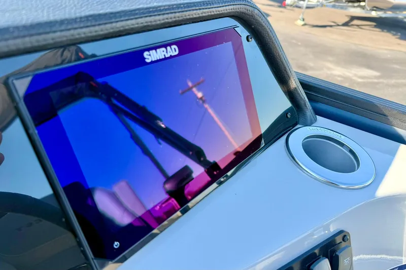 Slide: The Image of Simrad display on 2026 Crest Conquest 210 Fish boat dashboard. - 30