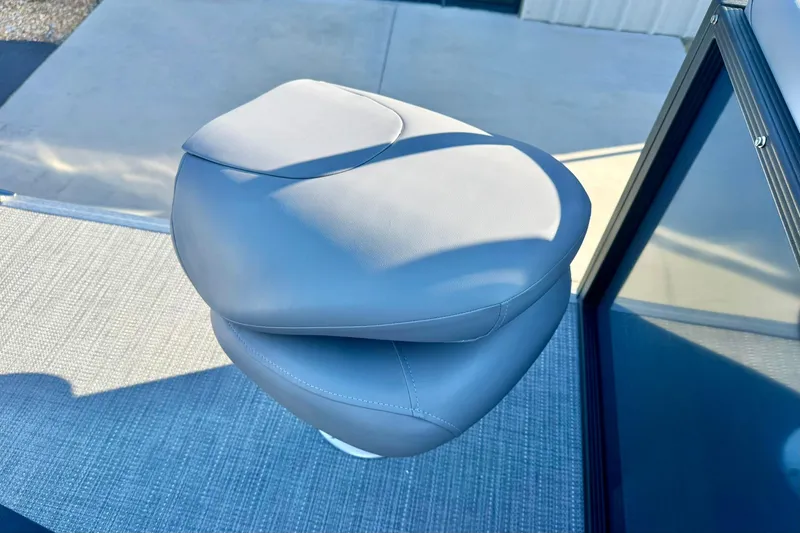 Slide: The Image of Gray seat on 2026 Crest Conquest 210 Fish boat, outdoor setting. - 43