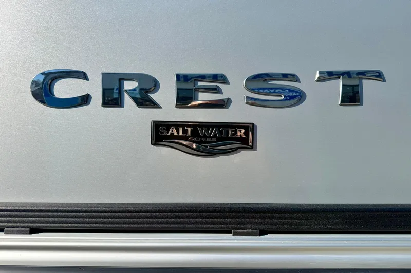 Slide: The Image of 2026 Crest Conquest 210 Fish Salt Water Series logo on boat exterior. - 8