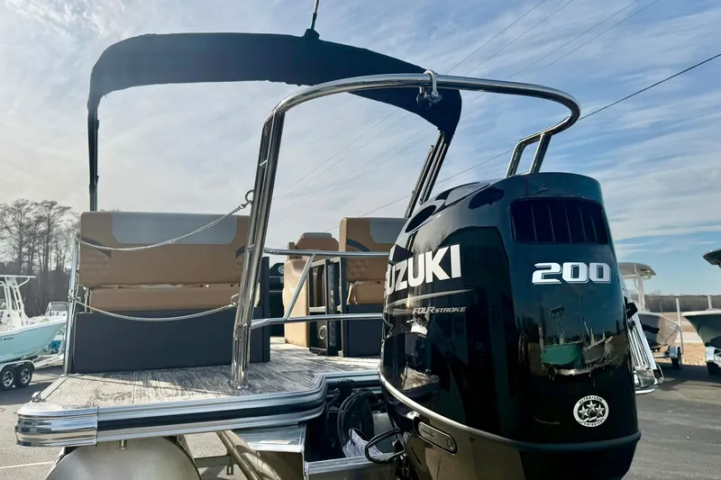 Slide: The Image of 2026 Crest Conquest 230 SLRC pontoon boat with Suzuki 200 outboard motor. - 37