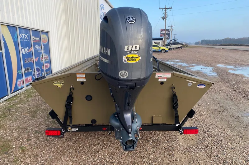 Slide: The Image of 2026 G3 Gator Tough 18 CCJ boat with Yamaha 80 Jet Drive engine, parked outdoors. - 6