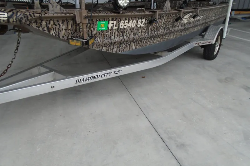 Slide: The Image of 2021 Pro-Drive SBX Series 17' boat on Diamond City trailer, Florida registration. - 15