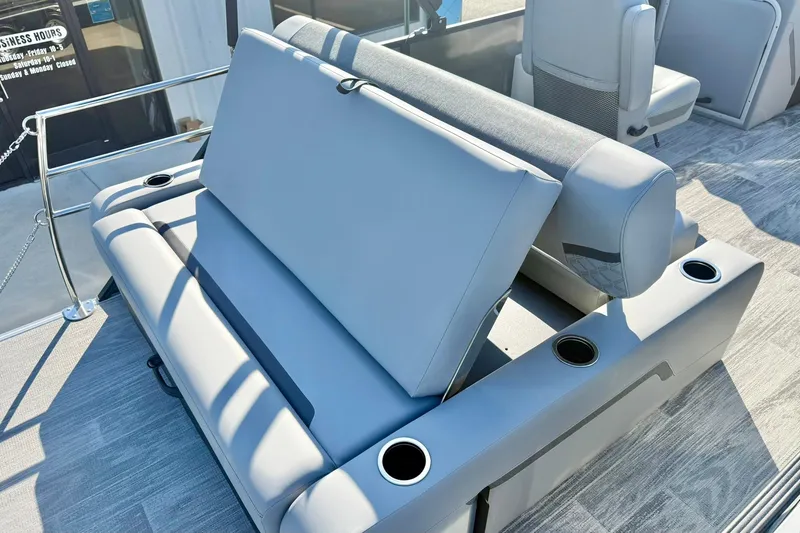 Slide: The Image of 2026 Crest Conquest 235 SLSC boat interior with adjustable seating and cup holders. - 45
