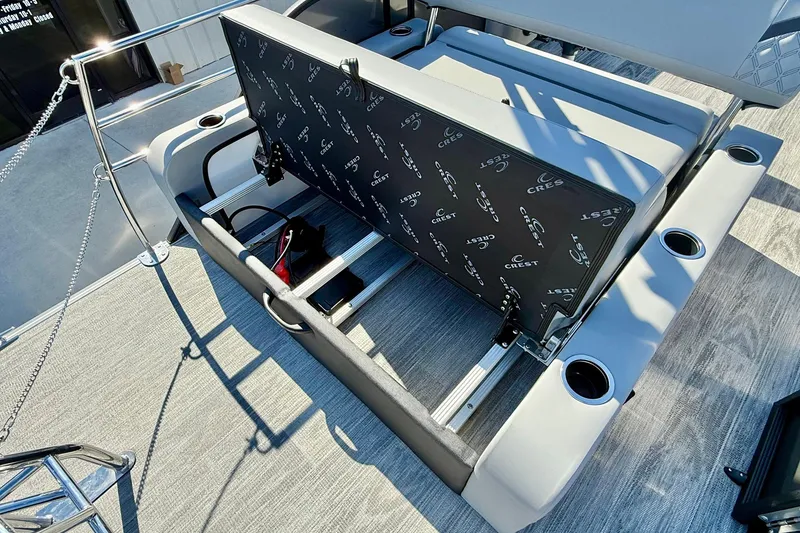 Slide: The Image of 2026 Crest Conquest 235 SLSC boat interior with adjustable seating and cup holders. - 50