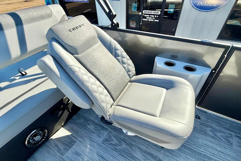 Slide: The Image of Luxurious seating on 2026 Crest Conquest 235 SLSC boat with cup holders. - 33
