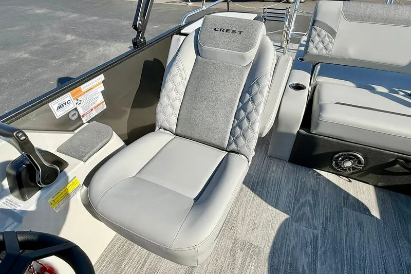 Slide: The Image of Luxurious seating on 2026 Crest Conquest 235 SLSC boat, featuring modern design and comfort. - 37