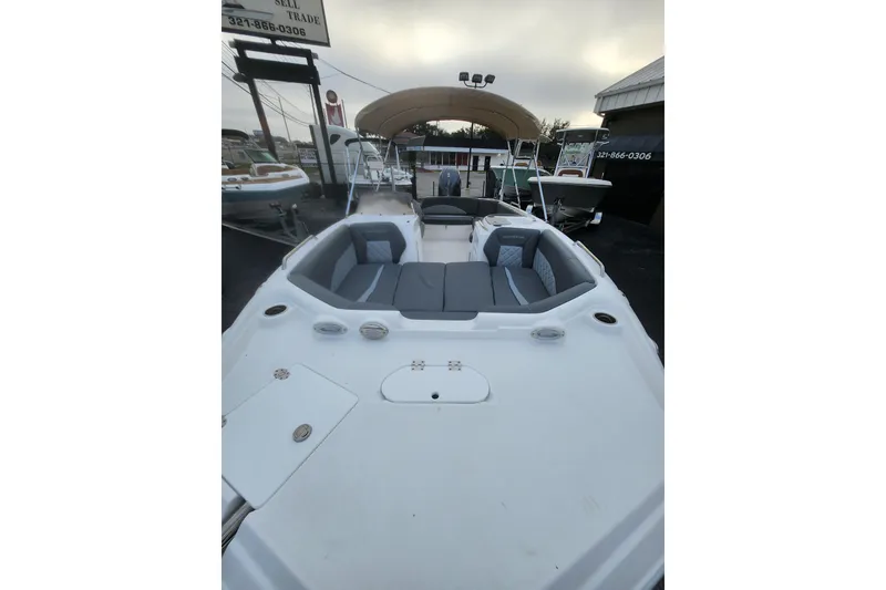 Slide: The Image of 2026 NauticStar 203 SC boat with spacious seating and modern design. - 9