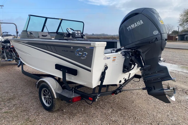 Slide: The Image of 2026 G3 Angler V1850 SF boat with Yamaha outboard motor on trailer. - 4