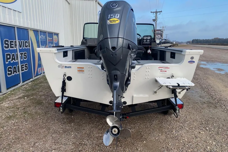 Slide: The Image of 2026 G3 Angler V1850 SF boat with 150 horsepower motor, parked near service center. - 5