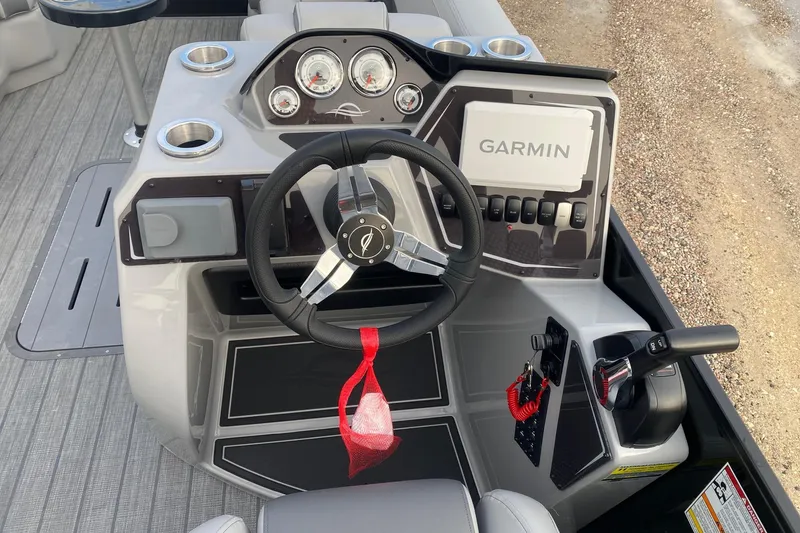 Slide: The Image of Steering console of 2026 SunCatcher Fusion 322SS with Garmin navigation system. - 10
